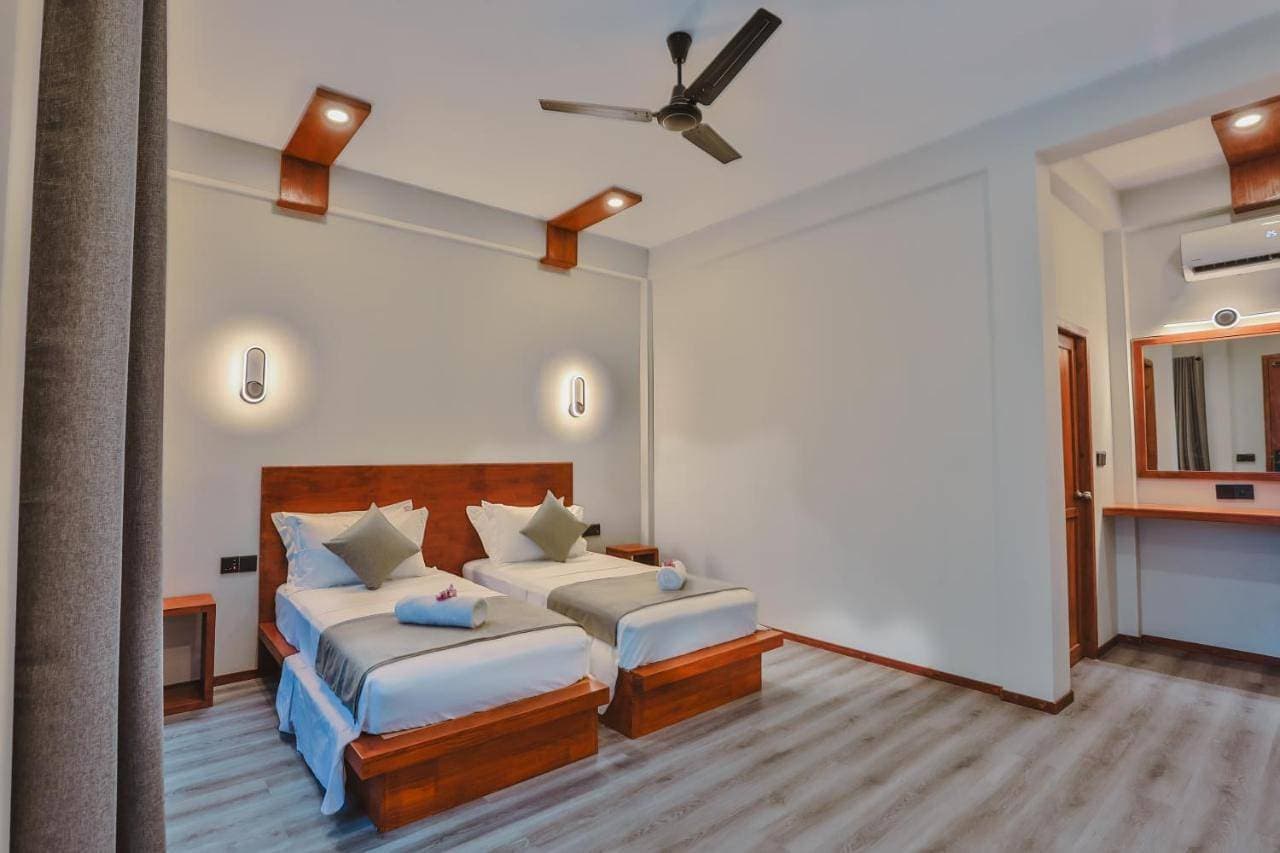 Foto 9 von 12: Standard Twin Room with Garden View