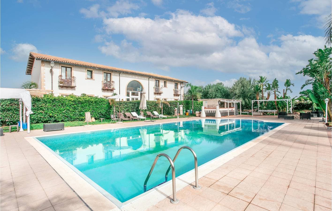 Foto 4 von 27: Gemütliches 65qm Apartment mit Klimaanlage, Pool und Küche