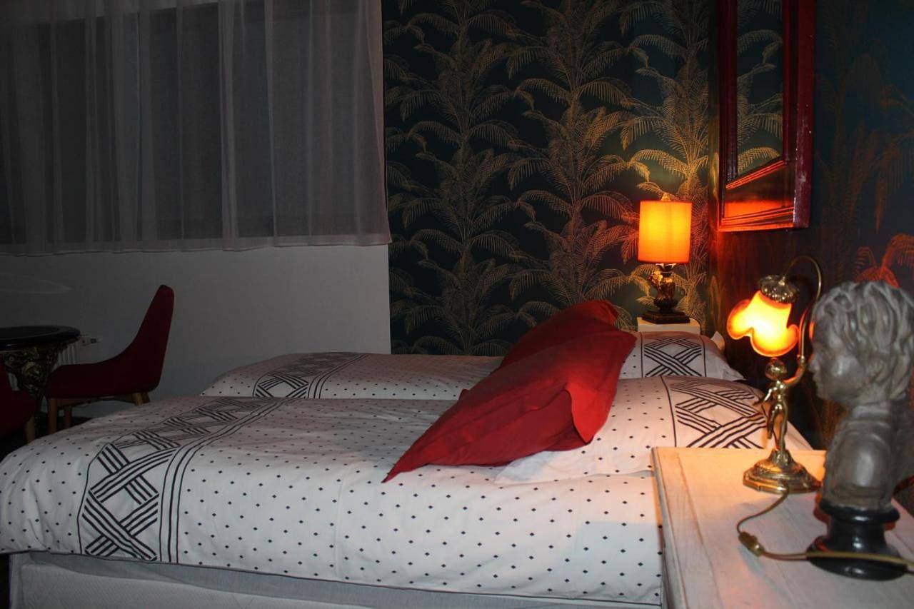 Foto 2 von 11: Twin Room with Private Bathroom