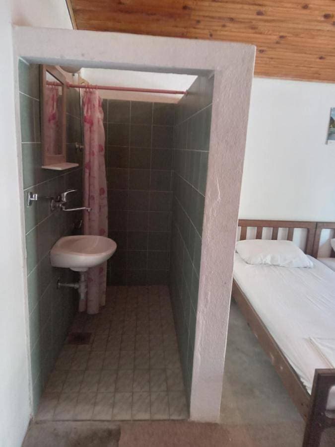 Foto 3 von 11: Basic Triple Room with Shared Bathroom