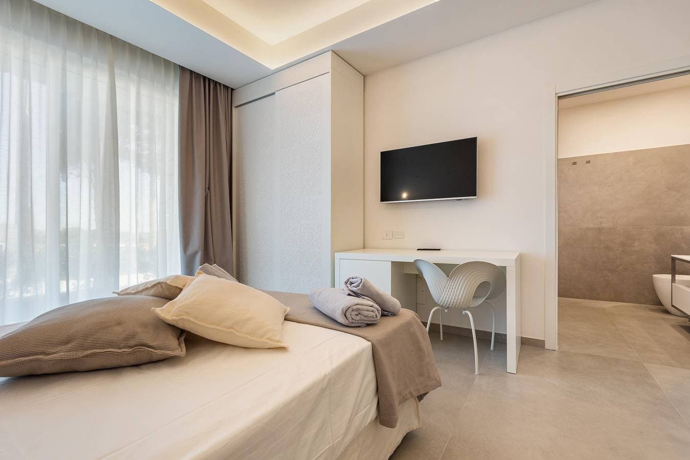Foto 4 von 55: Zimmer für 4 Personen mit Pool