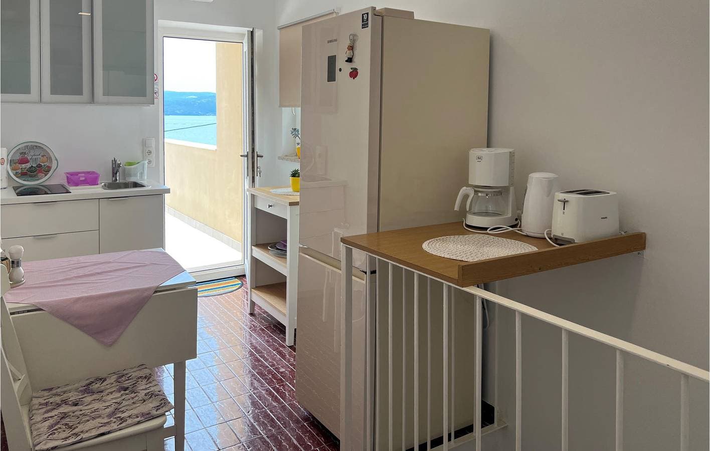 Foto 5 von 26: Gemütliche 300 m zum Strand: Klimatisierte Wohnung mit Terrasse und Parkplatz