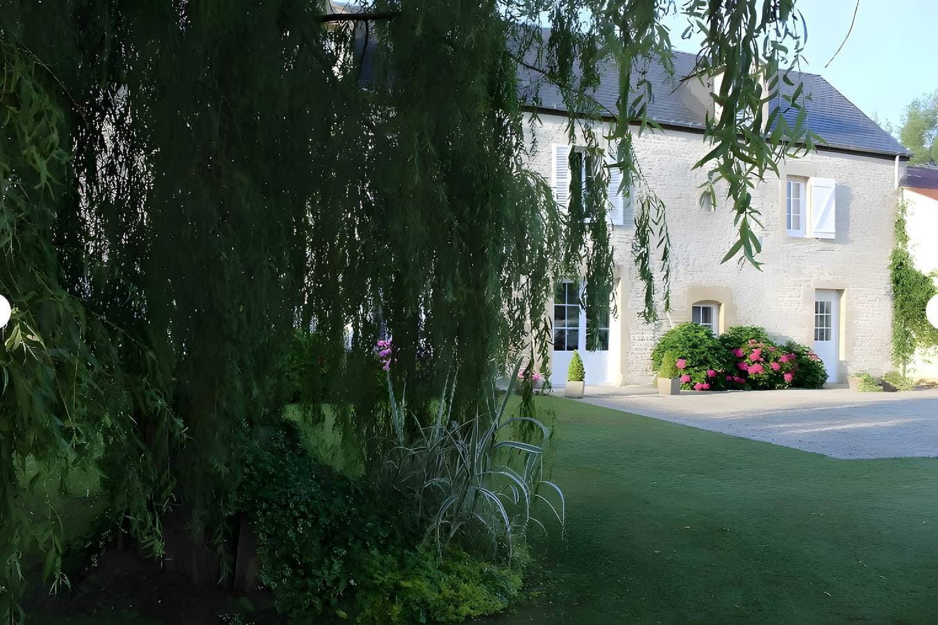 Foto 2 von 28: Gästezimmer 'Entre Mer Et Terre - Chambre Rubis' mit Gemeinschaftsgarten und WLAN