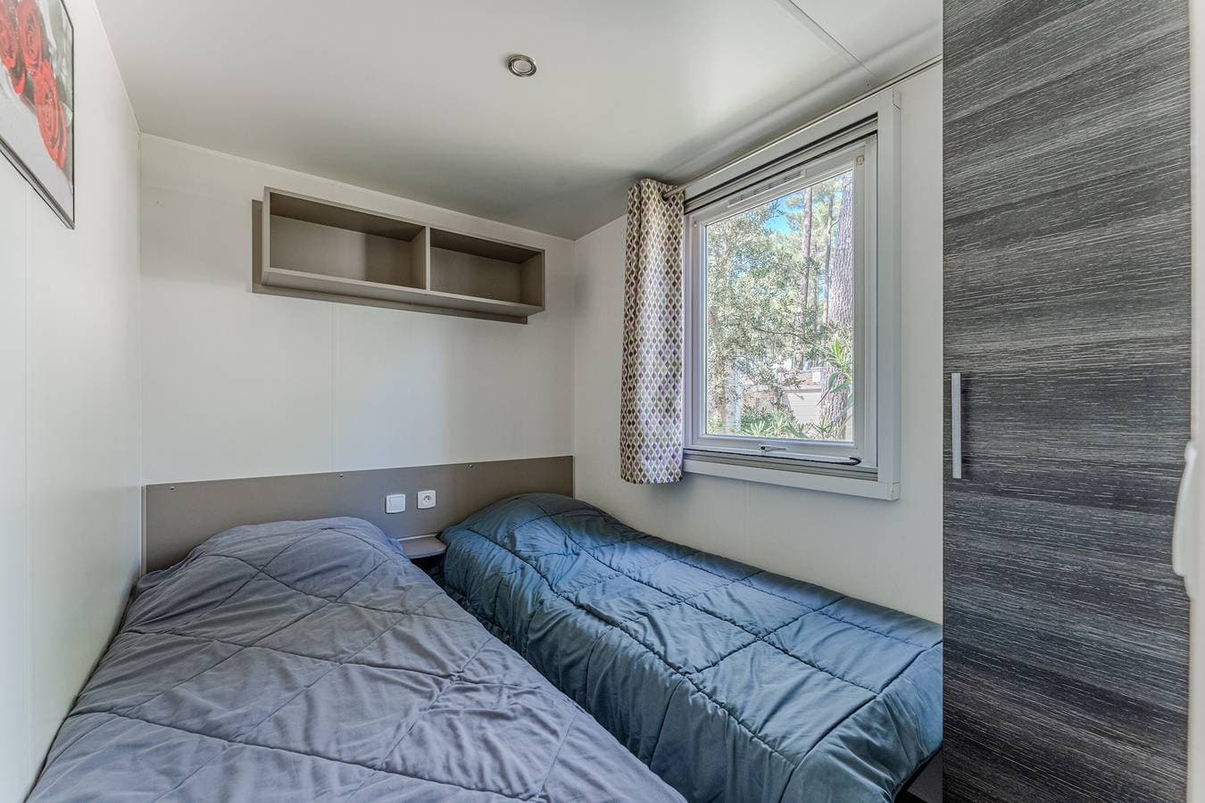 Foto 12 von 25: Mobilheim 'Les Dunes De Contis' mit Gemeinschaftspool, privater Terrasse und Klimaanlage