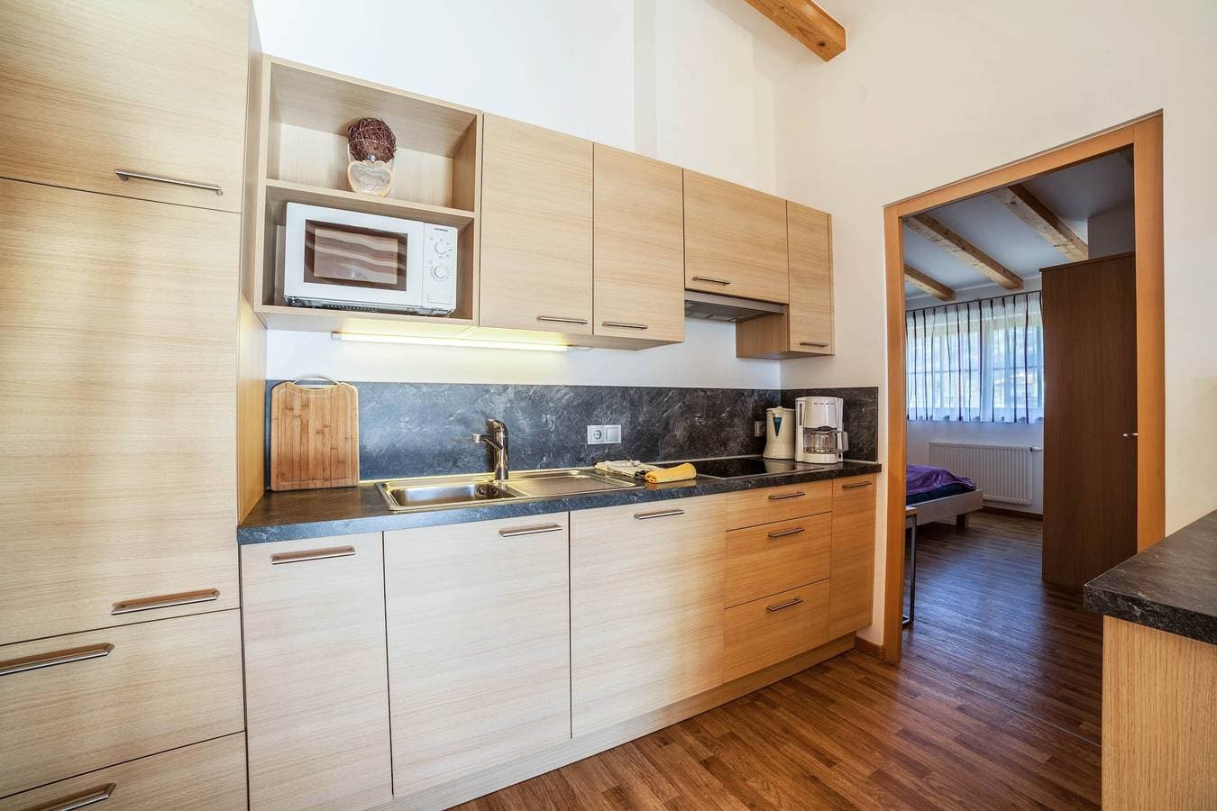 Foto 10 von 29: Ferienwohnung "Feldhof Apfeltraum" mit Salzwasser Pool, Panoramaliegewiese und Balkon