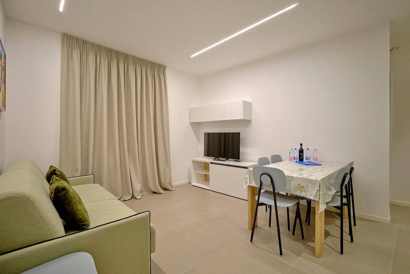Foto 4 von 14: ApartmentsArena - Residenza Dei Doganieri - B