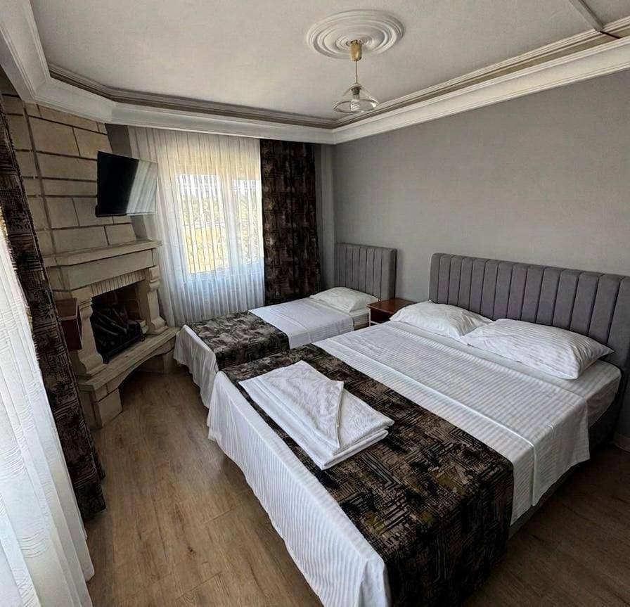 Foto 5 von 6: Triple Room