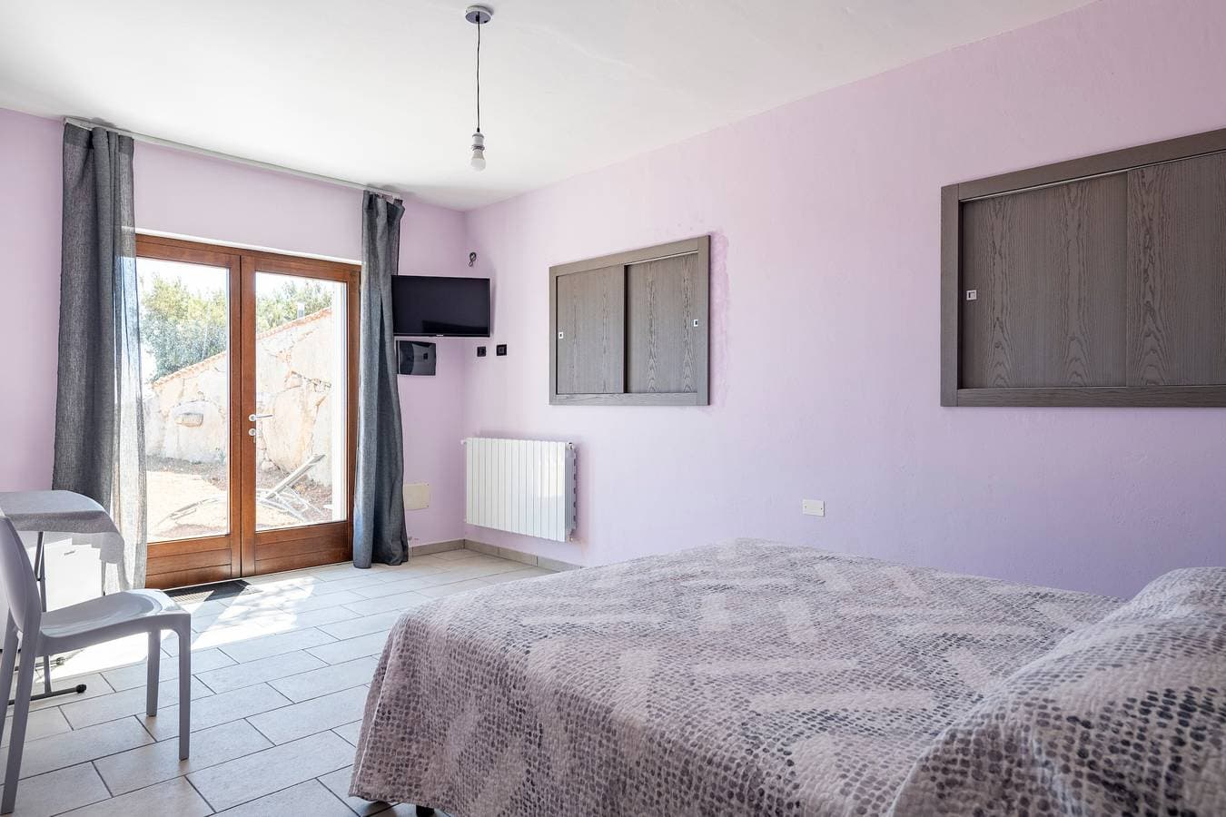 Foto 10 von 23: Ferienhaus 'Ami' mit Meerblick, privater Terrasse und Gemeinschaftsgarten