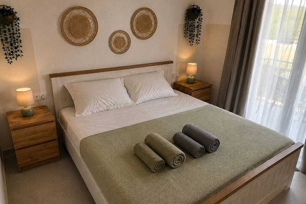 Foto 4 von 28: Villa Irini Ocean View 2-bedroom apartment with AC in charming Fryni