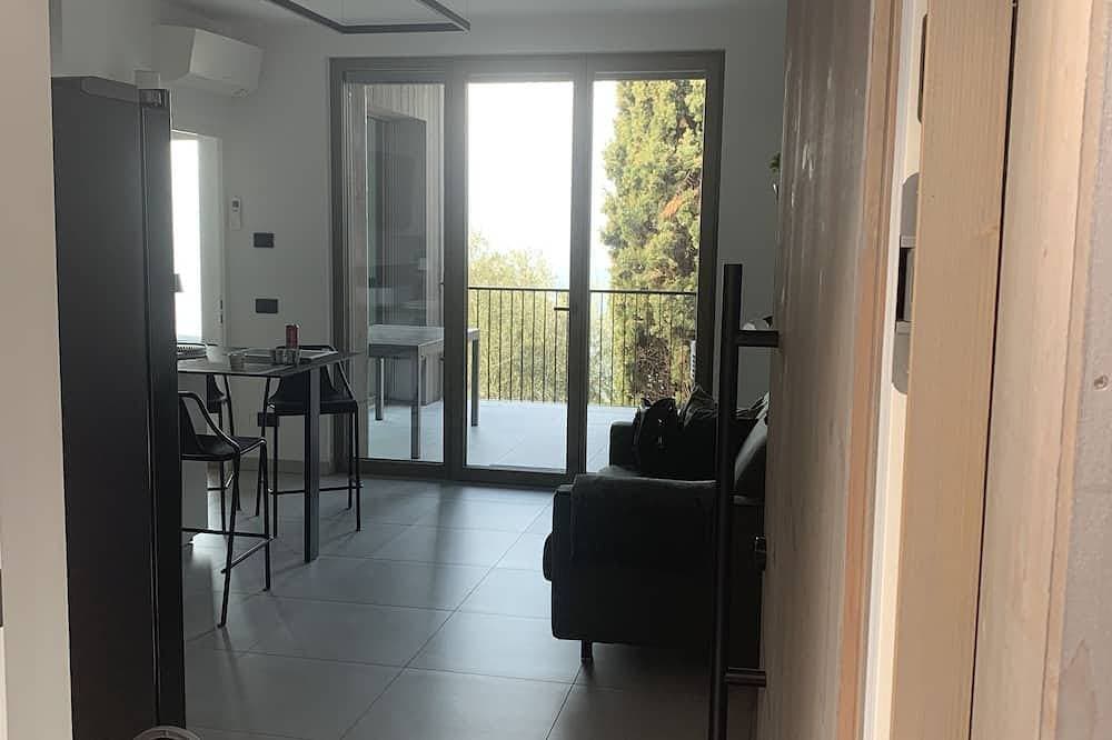 Foto 12 von 30: 3 Zimmer Apartment am  Gardasee mit traumhaften Seeblick und Pool in Torri