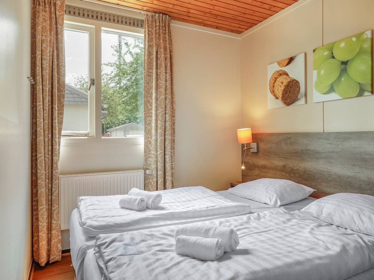 Foto 7 von 27: Bungalow für 4 Personen mit Balkon/Terrasse