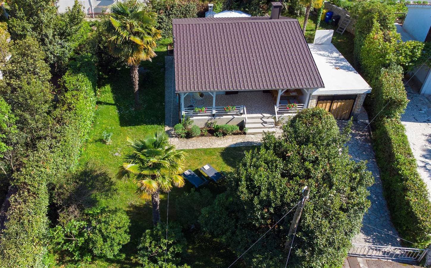 Ferienhaus Memento mit Garten 1