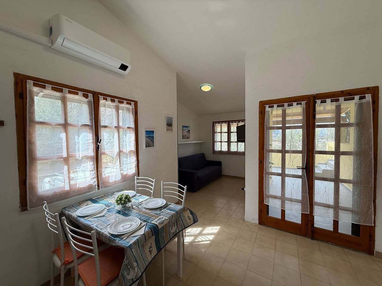 Foto 2 von 15: Ferienwohnung 'Casa Bougainville Cala D'Ambra' mit Meerblick, WLAN & Klimaanlage