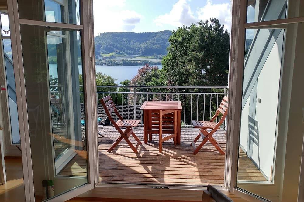 Ferienwohnung für 3 in Hanglage mit Traumblick auf den See 1