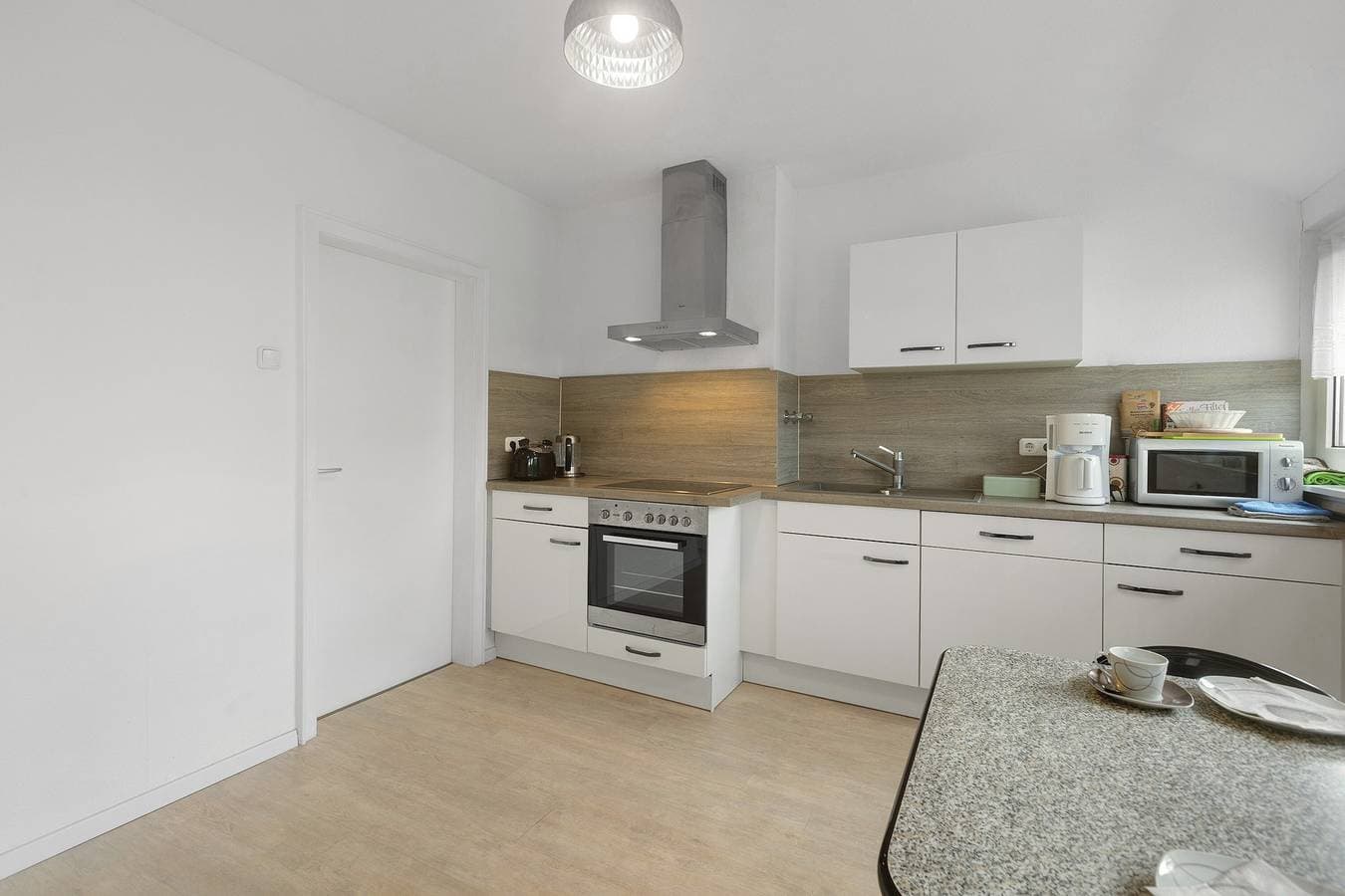 Foto 11 von 24: Ferienwohnung 'Ruhepol, 75qm' mit Gemeinschaftspool, Gemeinschaftsgarten und Wi-Fi
