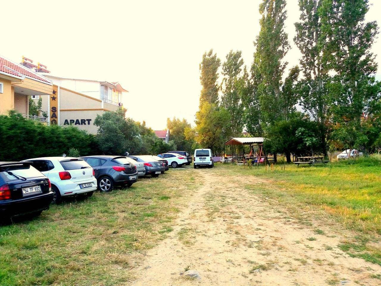 Foto 6 von 26: Quadruple Room with Garden View