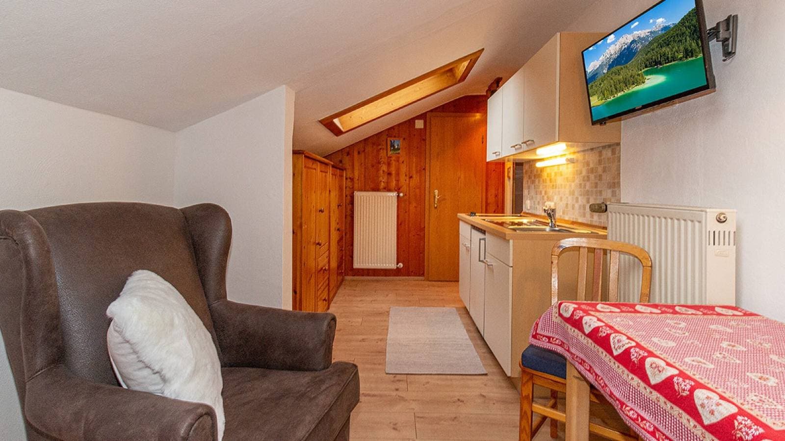 Foto 4 von 14: Einzimmerapartment 'Mini Apartment 3' mit Bergblick, Gemeinschaftsgarten und WLAN
