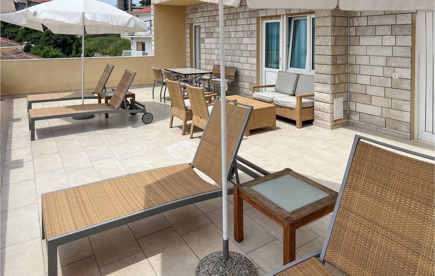 Foto 12 von 26: Gemütliche 300 m zum Strand: Klimatisierte Wohnung mit Terrasse und Parkplatz