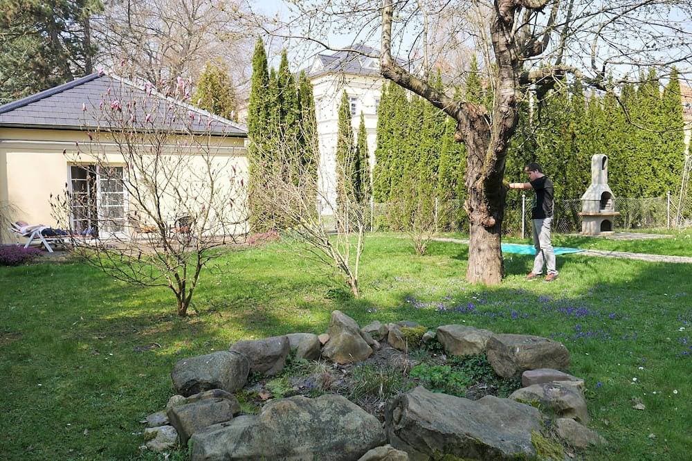 Foto 12 von 30: Idyllisches Ferienhaus mit Terrasse und romantischen Garten in zentraler Lage