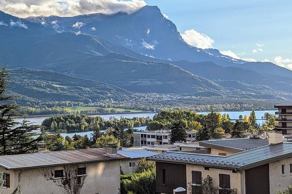 Foto 11 von 12: L'Embrun du Lac - Mountain & Lake views - Water feature - Ideal location.