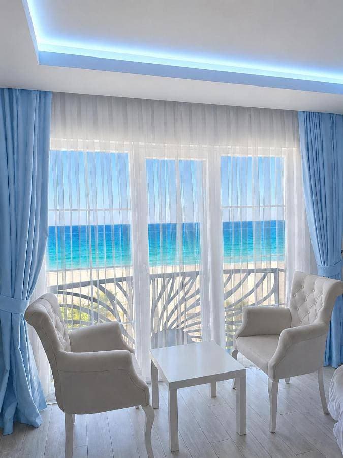 Foto 4 von 10: Quadruple Room with Sea View