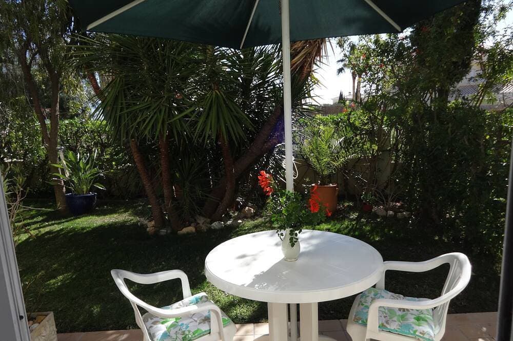 Cozy studio in the garden with terrace 1