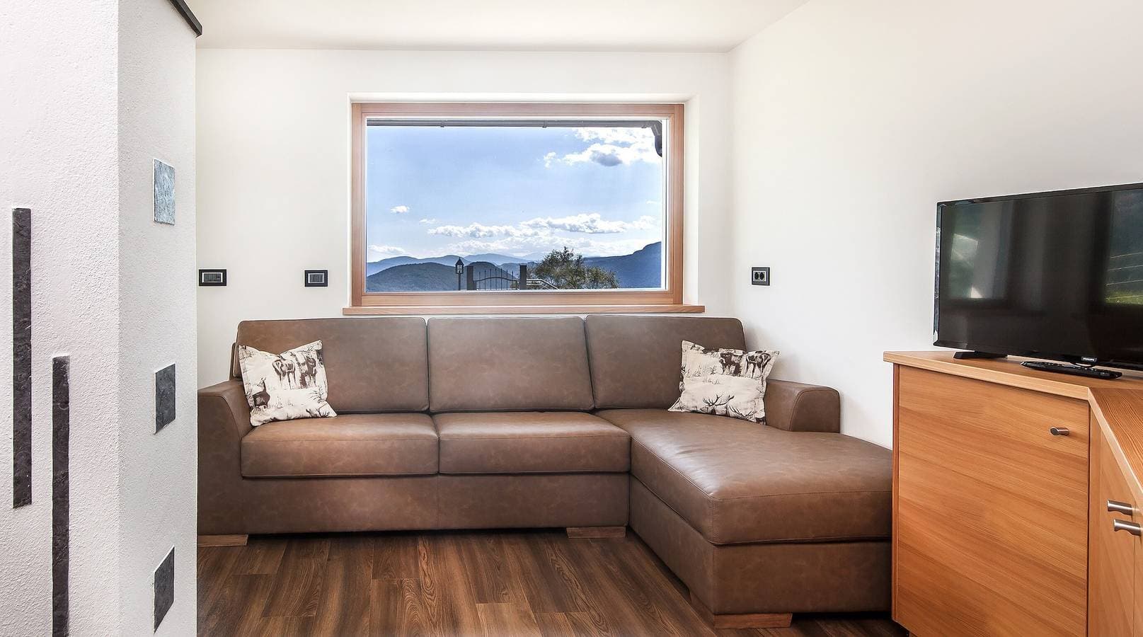 Foto 8 von 12: Ferienwohnung 'Avea App 1-2 Personen' mit Bergblick und Garten