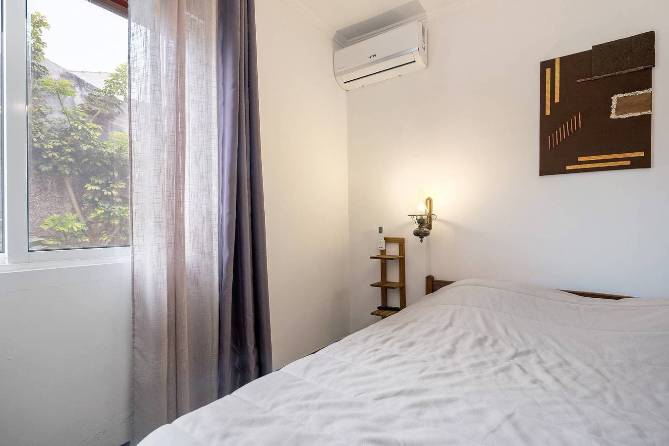 Foto 4 von 30: Zimmer 'Quarto Bela Noite' mit Gemeinschaftsterrasse, WLAN und Klimaanlage