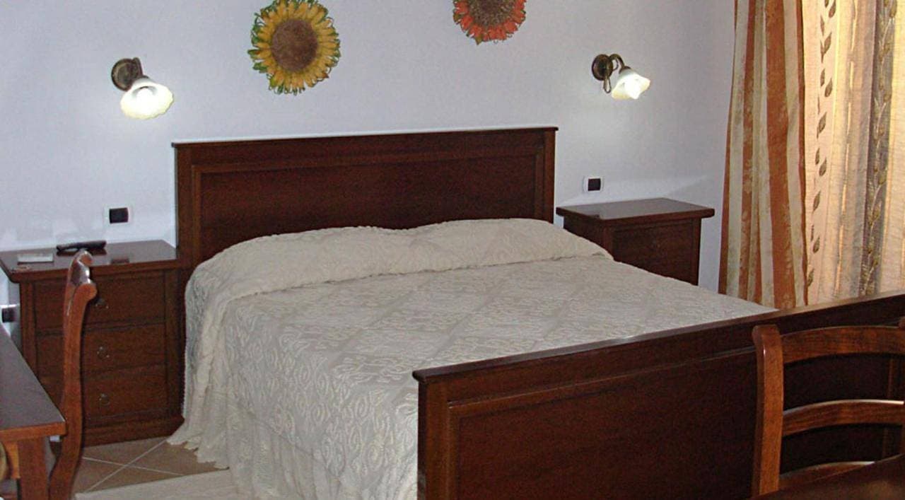 Foto 7 von 18: Quadruple Room
