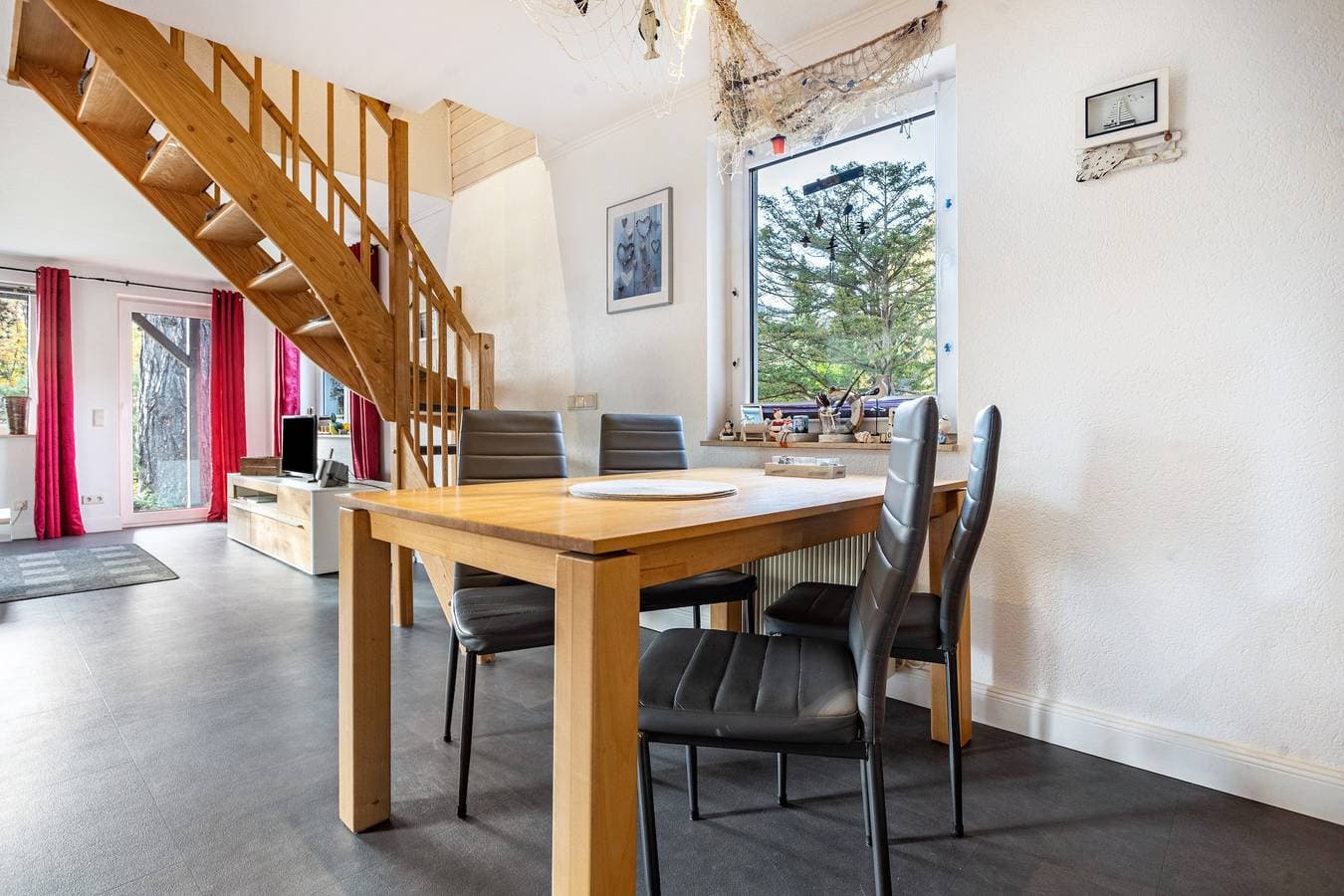 Foto 12 von 31: Ferienhaus 'Lütt-Matten' mit Gemeinschaftsterrasse, privatem Garten und WLAN