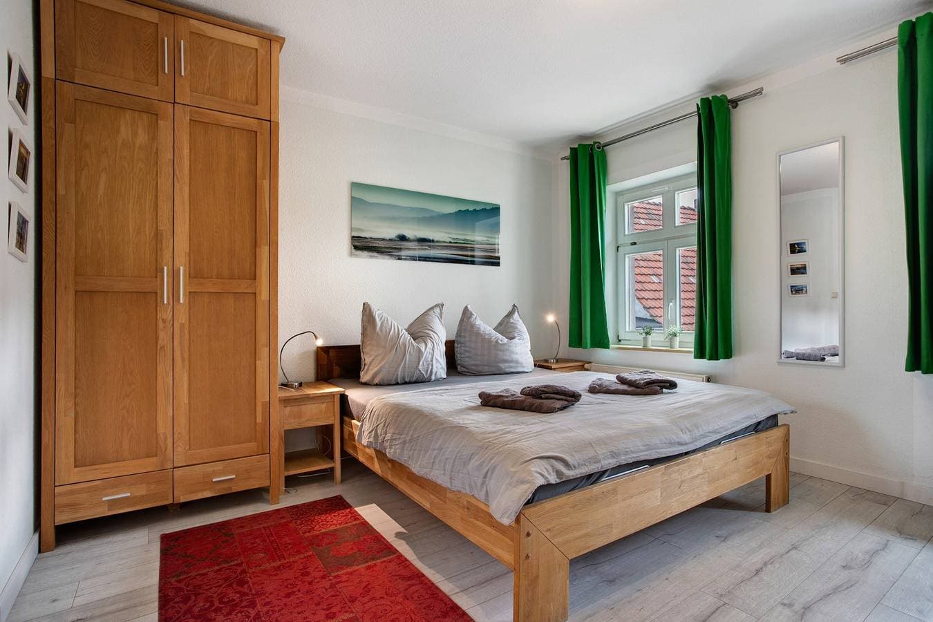 Foto 2 von 19: Einzimmerapartment 'Bäckerhus - Ferienwohnung 3' mit Gemeinschaftsterrasse und Garten