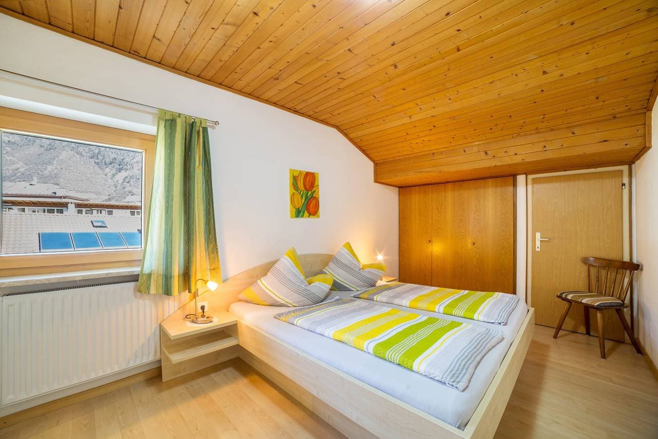 Foto 9 von 23: Ferienwohnung 'Typ A Pöder's Haus' mit Bergblick, Gemeinschaftsgarten und WLAN