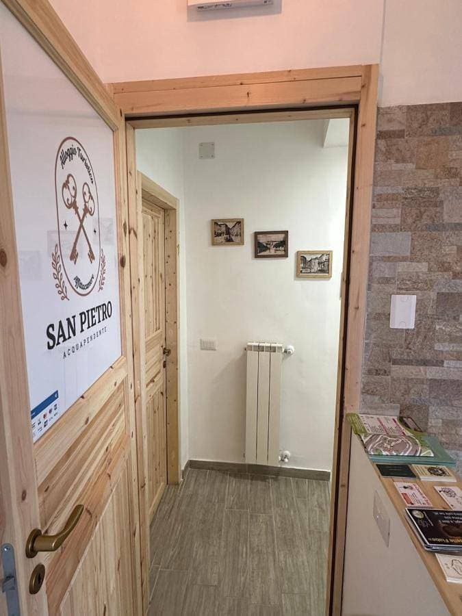 Foto 4 von 13: Triple Room with Private Bathroom