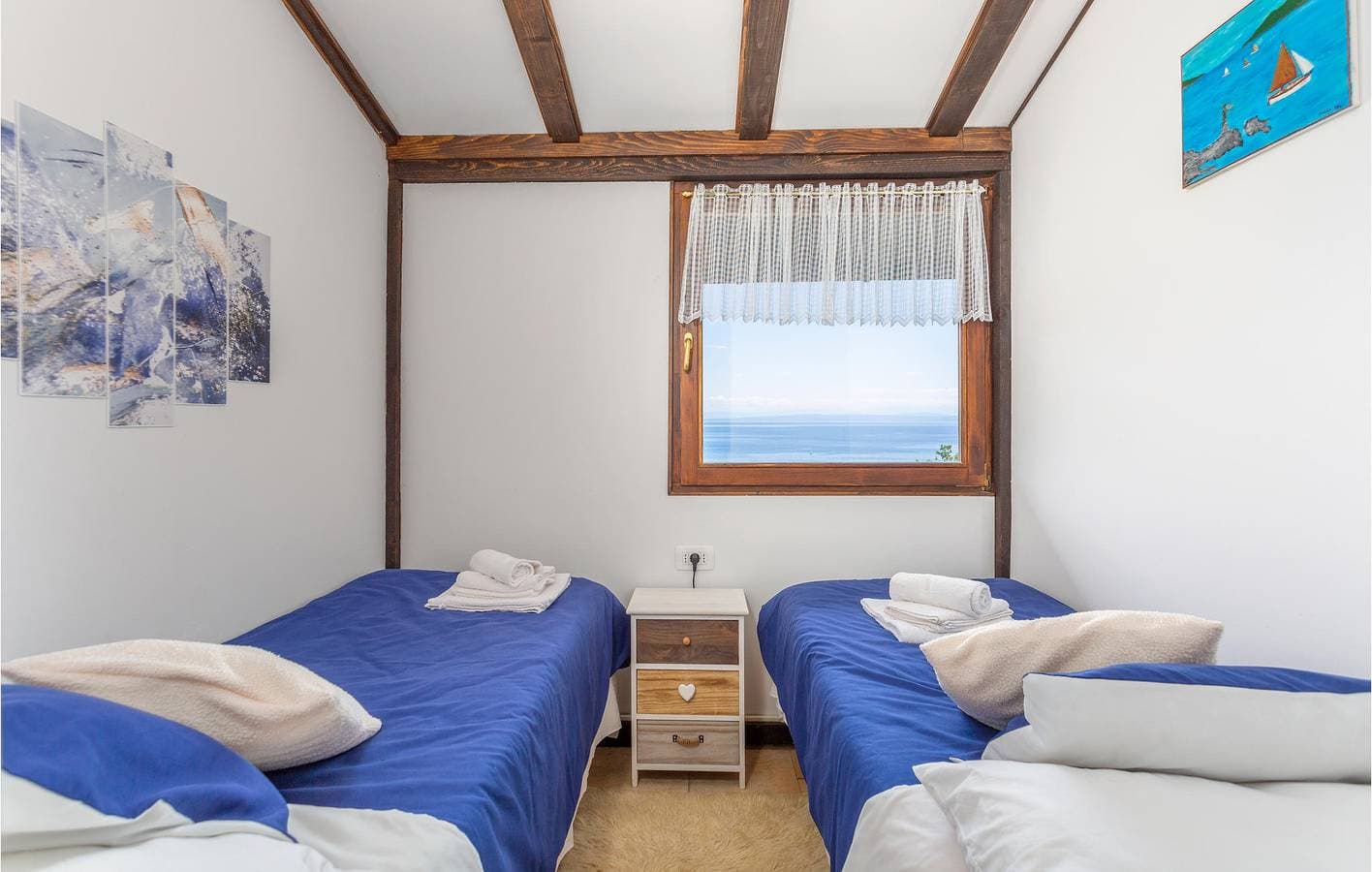 Foto 9 von 36: Apartment am Meer mit beheiztem Pool, Parkplatz und Terrasse