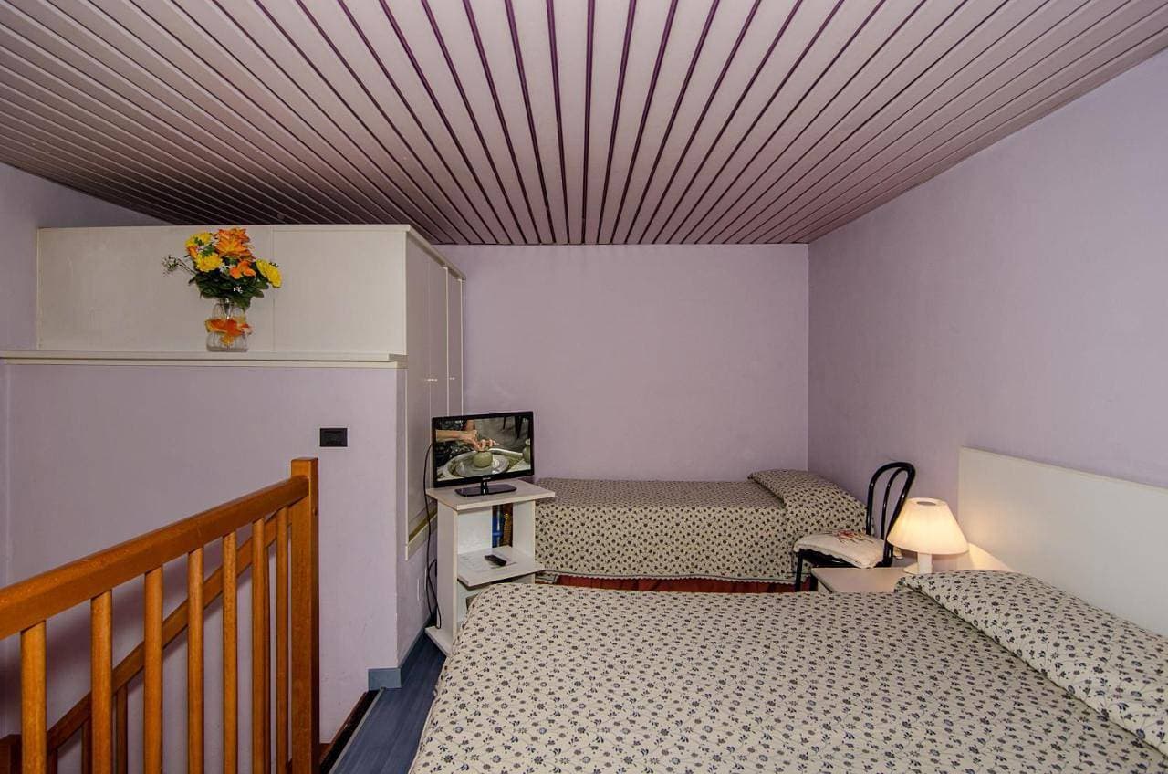 Foto 9 von 21: Quadruple Room