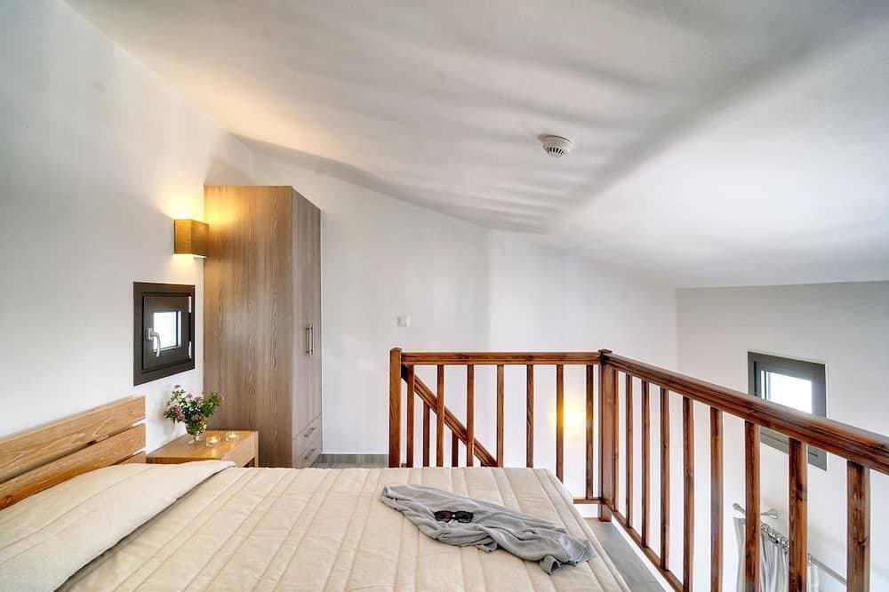 Foto 2 von 24: Myrtos Mare Suites - Seafront Maisonette