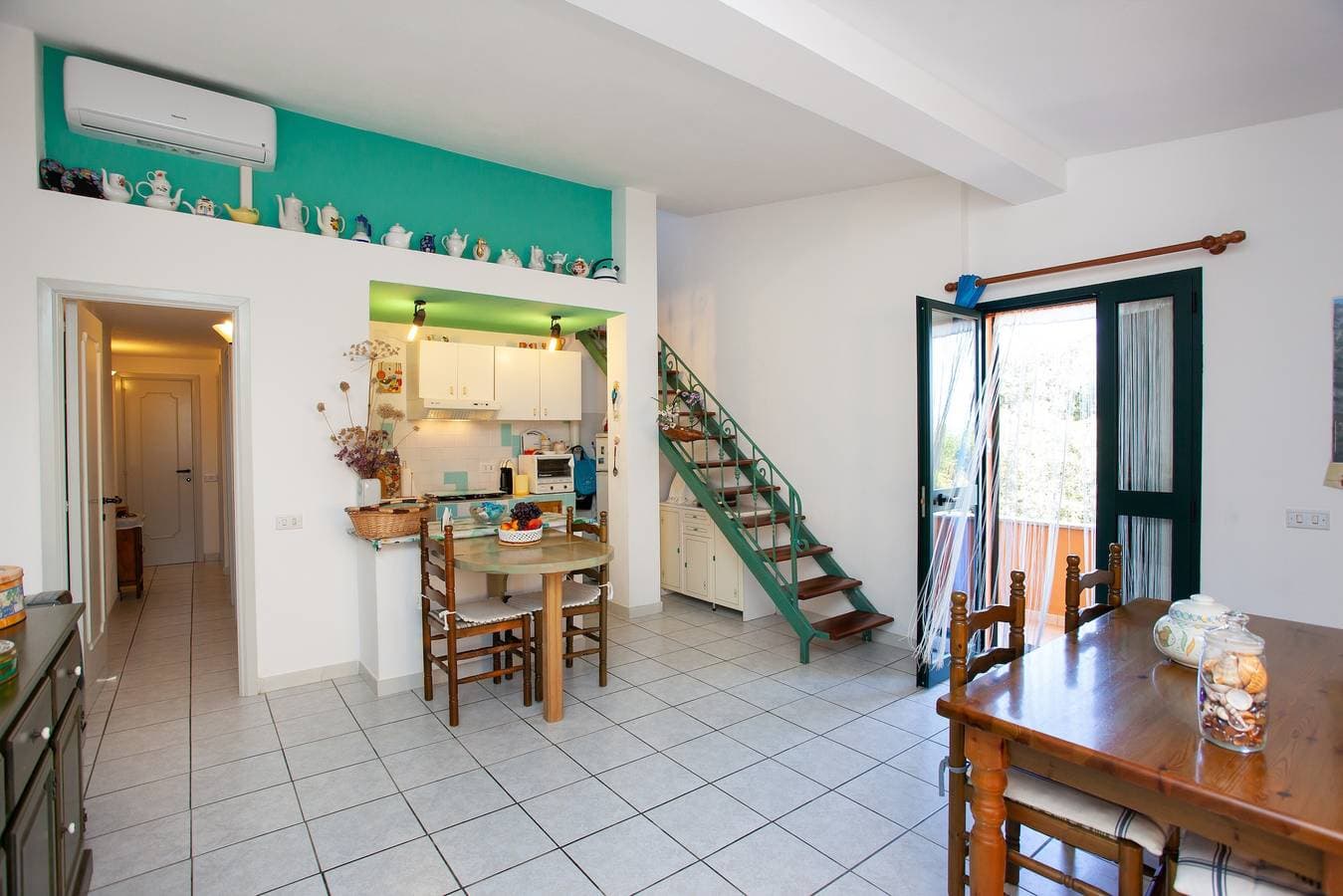 Foto 12 von 26: Ferienwohnung 'Capo comino a due passi dalla spiaggia' mit Terrasse und Klimaanlage