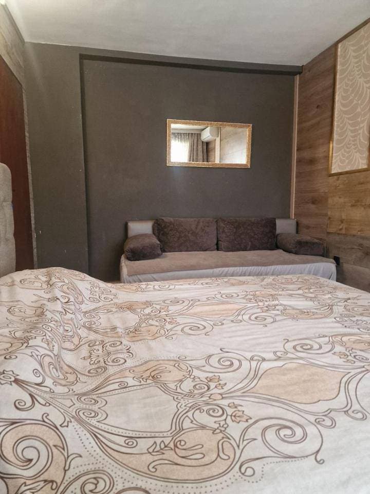 Foto 6 von 12: Basic Triple Room with Shared Bathroom