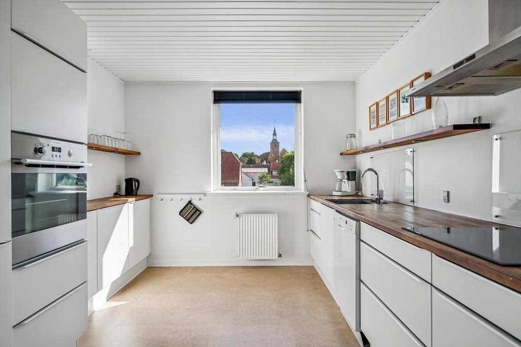 Foto 9 von 19: Zentral gelegene Stadtwohnung am Hafen von Ebeltoft mit Aussicht vom Wohnzimmer und der Dachterrasse