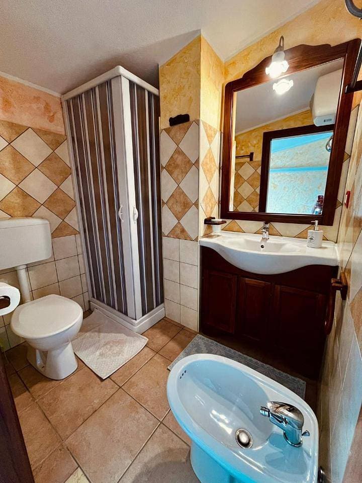 Foto 13 von 15: Triple Room with Private Bathroom