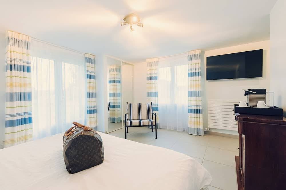 Foto 2 von 30: Clos Céleste - Campagne D'etretat - Piscine et spa - Chambre B