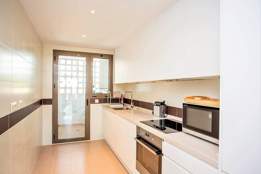 Foto 12 von 30: Neue 2 Br / 2 Bad Reihenhaus Apt Cala de Mijas mit Blick auf Golf, Berge und Meer