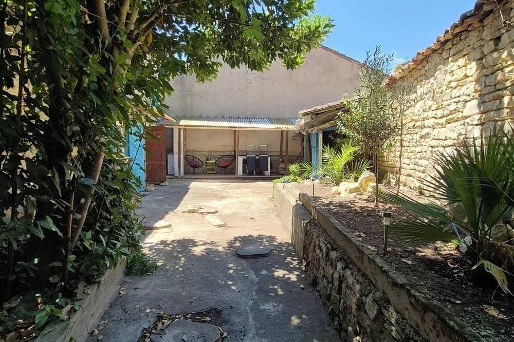 Foto 10 von 11: Family home with courtyard