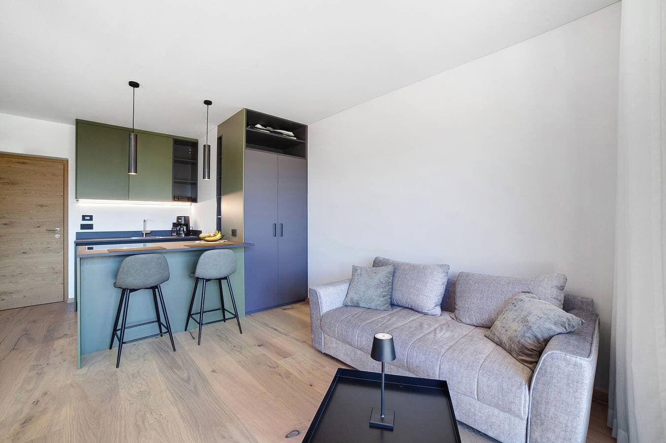 Foto 5 von 20: Einzimmerapartment 'Alivo Living Apartment Olivia' mit Bergblick, Gemeinschaftsterrasse und WLAN