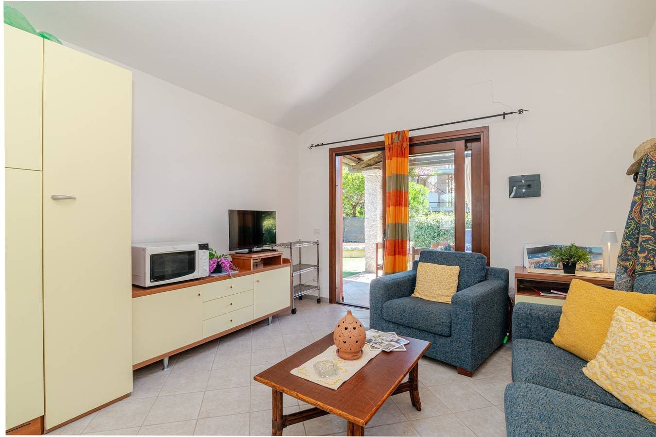 Foto 5 von 20: Villetta Girasole: Apartment mit privater Terrasse, Garten und Klimaanlage