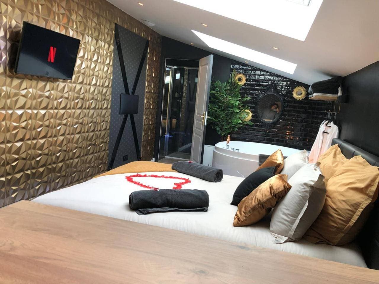 Foto 10 von 12: Deluxe Suite with Spa Bath