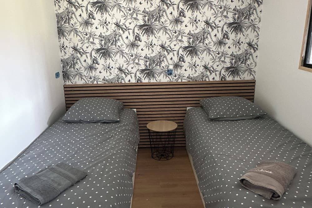 Foto 2 von 28: Listed 3-star ⭐️⭐️⭐️ beachfront home with 3 bedrooms, a garden, and private parking.