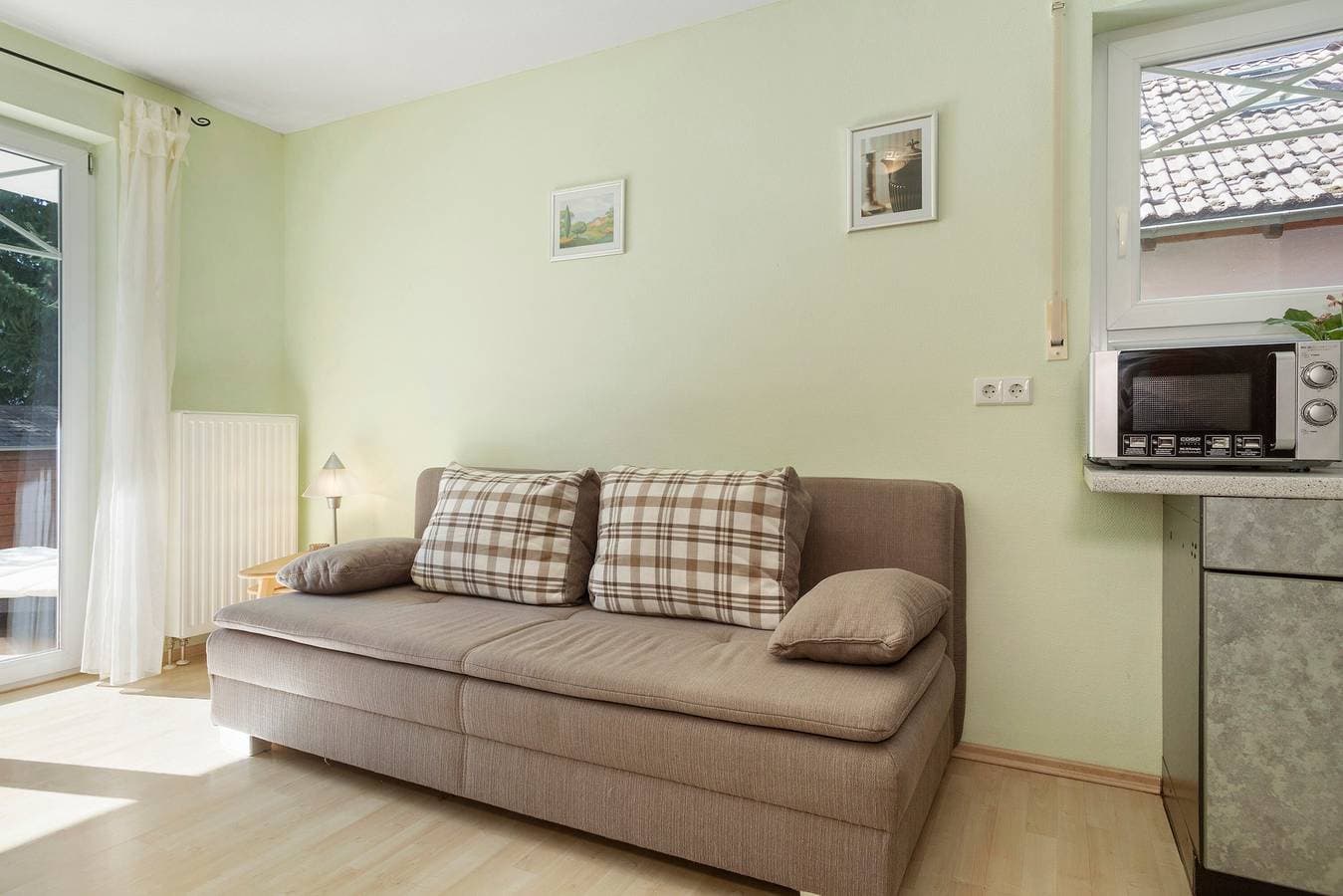 Foto 4 von 21: Ferienwohnung 'Jacqueline' mit privater Terrasse, Gemeinschaftsgarten und Wi-Fi