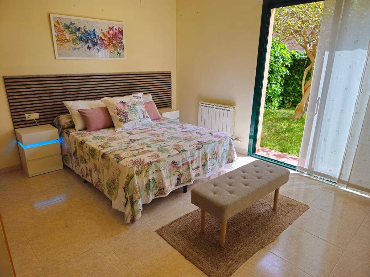 Foto 2 von 41: One-Bedroom House with Private Garden