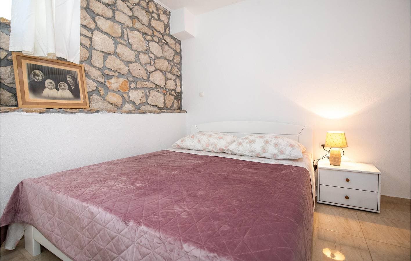 Foto 7 von 32: Gemütliche 300 m zum Strand: Klimatisierte Wohnung mit Terrasse und Parkplatz